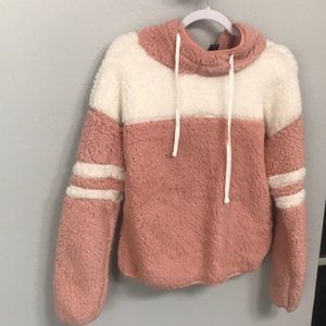 Fuzzy hooded sweatshirt.